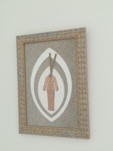 Galerie 53 Encadrement d'un motif en liège Simple passe partout rehausssé de plusieurs formes ovales dissymétriques